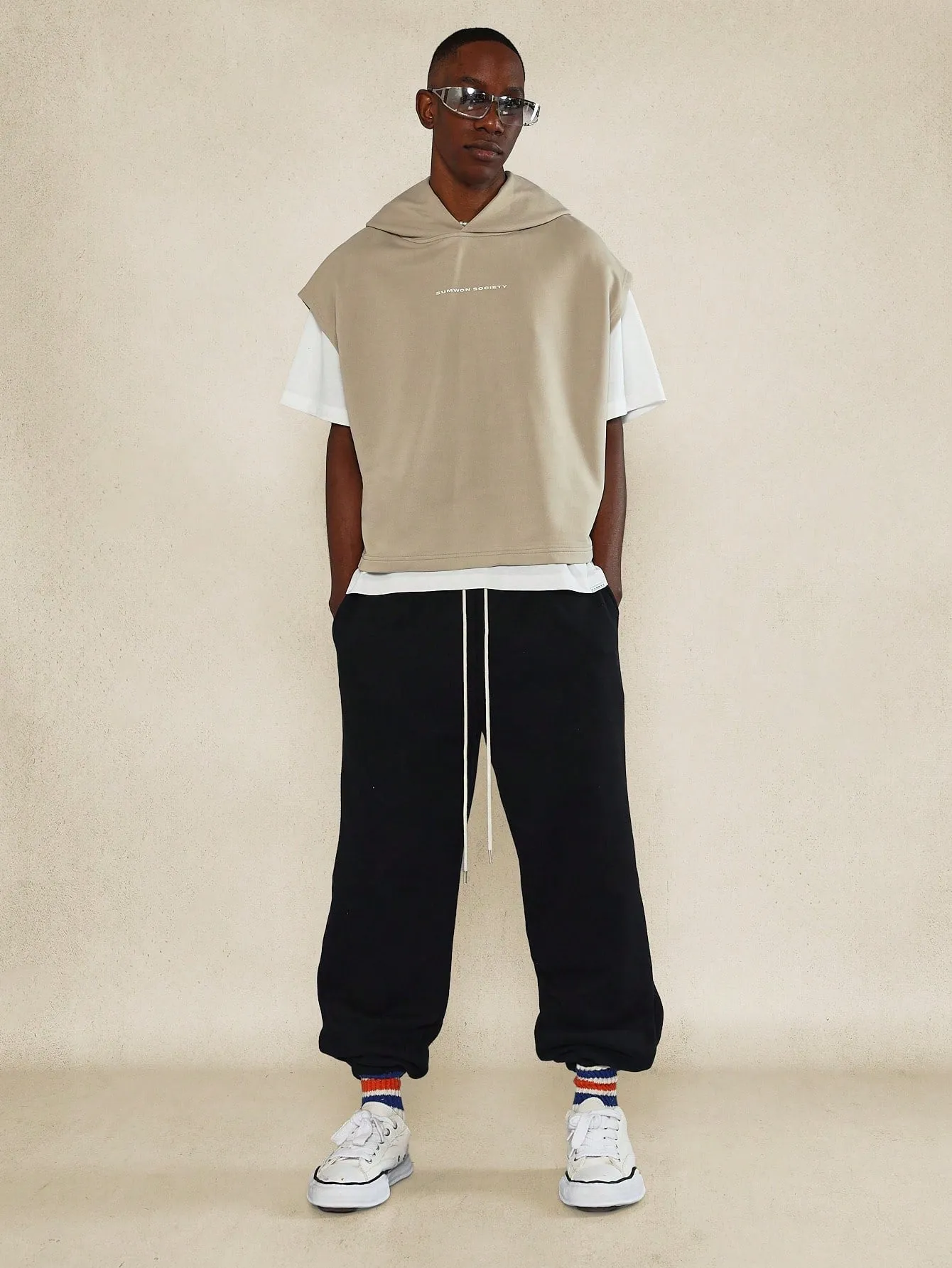 Boxy Fit Sleeveless Hoodie With Front Graphic Print