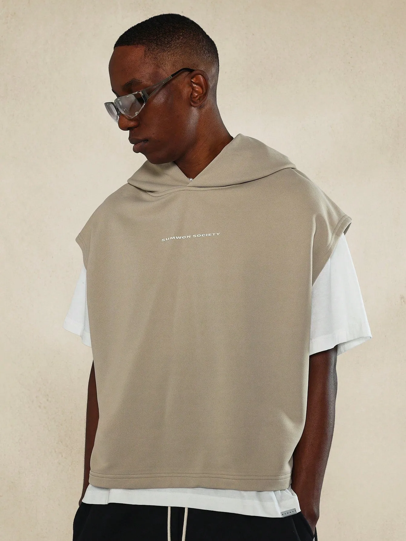 Boxy Fit Sleeveless Hoodie With Front Graphic Print